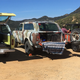 The yellow truck is a “standard” Traveller, while my camo one has an apparently unusual combination tailgate.